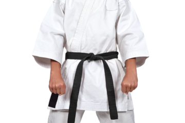 A karate guy in a white kimono and a black belt got ready to do Kata. Strength, endurance, and martial arts concept