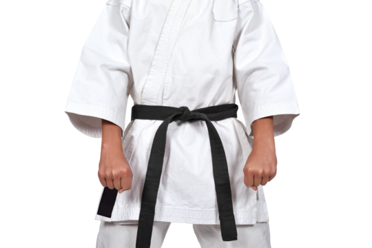 A karate guy in a white kimono and a black belt got ready to do Kata. Strength, endurance, and martial arts concept