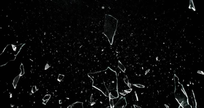 This striking video showcases the mesmerizing effect of glass shattering against a sleek black background, making it ideal for motion graphics and visual effects projects that aim to impress