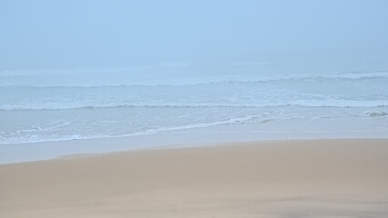 Foggy beach along the Atlantic ocean on a summer morning in Over, Portugal 