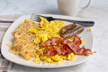 scramble eggs  with bacon  and sausage