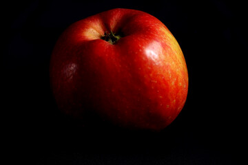 macro close-up of apple in isolated on the dark