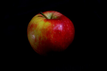 close up of apple in isolated on the dark