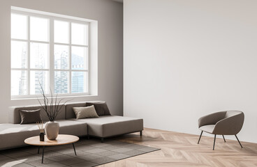 Gray sectional sofa, armchair, and round wooden table in minimalist living room interior design style, on wood herringbone flooring with white walls. 3D Rendering