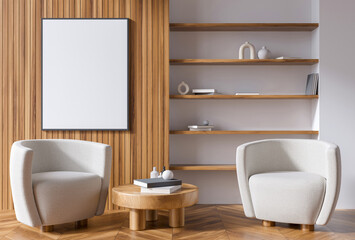 Cozy interior with blank vertical poster frame on wooden wall, modern armchairs, round table and minimal shelves in clean background. 3D Rendering
