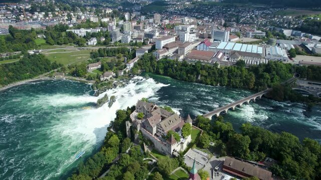 Aerial panoramic view of the Rheinfall waterfalls in Switzerland beside the city Schaffhausen on a sunny day in summer.