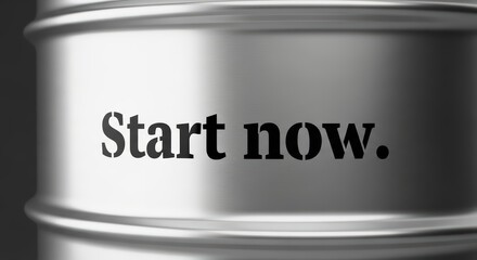 Motivational message on metallic surface: start now