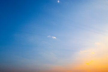 Evening sky with colorful few cloud sunset and blue sky on twilight. golden light before sundown. copy space
