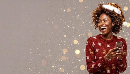 Smiling Black woman with an Afro wearing a gold Santa hat and red Christmas sweater with reindeer, holding a smartphone. Festive gray bokeh background with gold snowflakes, joyful holiday atmosphere.