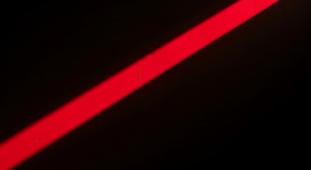 Black Friday Red diagonal line across dark background evokes focus on shopping season