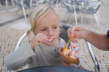 Little 4 Year Old Girl Eating Ice Cream