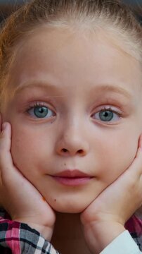 Portrait amazed shocked caucasian child girl daughter kid saying wow looking at camera at evening home surprised expression face wonder amazement reaction unexpected good news surprise achievement