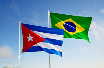 flags of cuba and brazil over blue sky background.