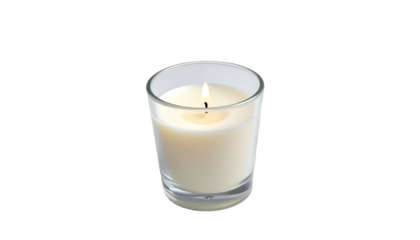 Glowing candle in glass holder, centered on black background