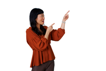 Asian woman pointing fingers up, showing surprise expression and making a wow gesture, transparent background