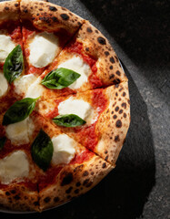 Irresistible Margherita pizza with fresh basil and melted mozzarella, perfect for culinary inspiration, restaurant menus, or Italian food blogs.
