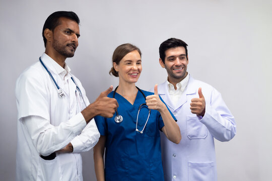 showing thumbs up, Portrait of Professional Healthcare staff Team. Male and female Doctor and nurses medicals staff. Professionalism successful teamwork and Unity - Powered by Adobe