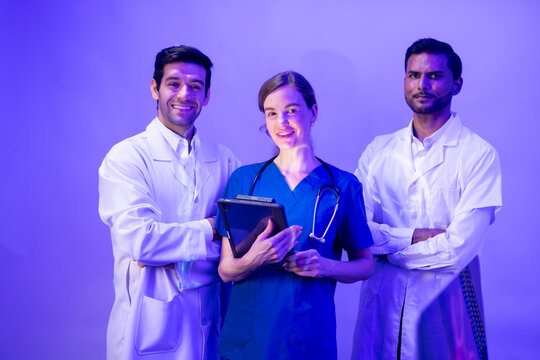 tablet mockup on screen for advertising. Portrait of Professional Healthcare staff Team. Male and female Doctor and nurses medicals staff. Professional successful teamwork and Unity