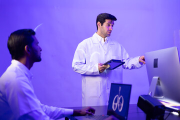 Hispanic man doctor teaching, Medical Training Presentation. Hospital Medical Research. Group of Doctor, nurse and healthcare professional meeting sitting boardroom, Planning and brainstorming health