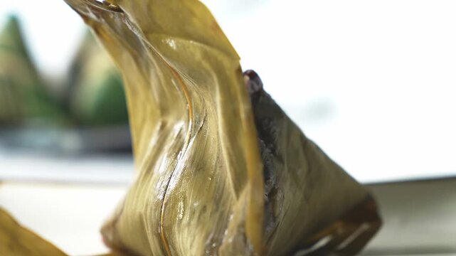 Peeled Corn Husks Revealing Traditional Steamed Dumplings Tamales Authentic Latin Cooking