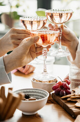 Glasses of rose wine seen during a dinner party of a celebration.