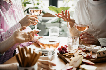 Glasses of rose wine seen during a dinner party of a celebration.