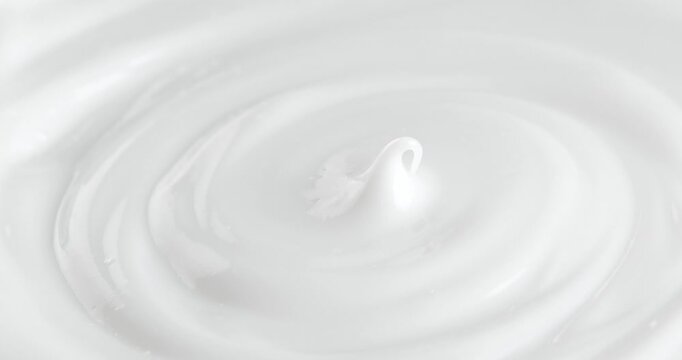 Cosmetic cream on a rotating table. Macro white smooth face cream texture, abstract beauty cosmetics background.