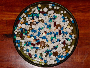 many different tablets on a plate 