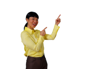 Asian woman smiling, pointing two fingers up and right, offering an excited presentation or recommendation on transparent background