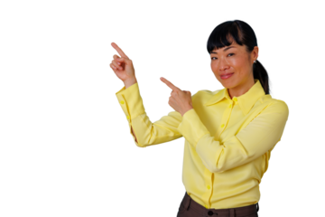 Asian businesswoman pointing fingers showing copy space, smiling and presenting information on transparent background