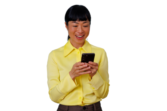 Asian woman using smartphone, smiling and engaging with mobile technology for communication and social network messaging