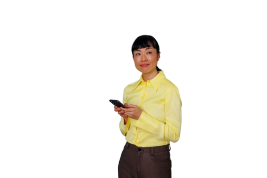 Asian businesswoman stands, holding a smartphone, looking away in a business concept, transparent background - Powered by Adobe