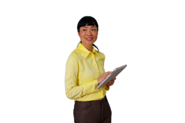 Asian businesswoman using a tablet, smiling and looking away, showcasing technology and innovation, transparent background