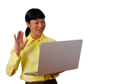 Asian woman having a video call on laptop, waving hand, communicating remotely for business, smiling, cut out - Powered by Adobe