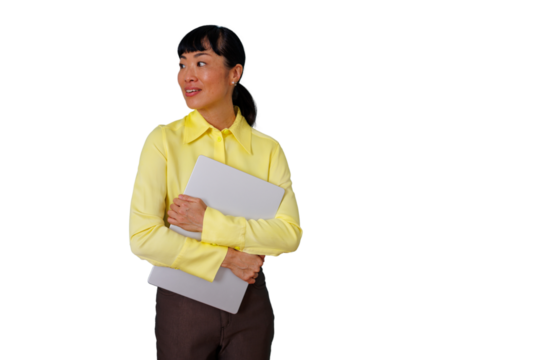 Asian businesswoman holding laptop smiling and looking away, professional female with transparent background - Powered by Adobe