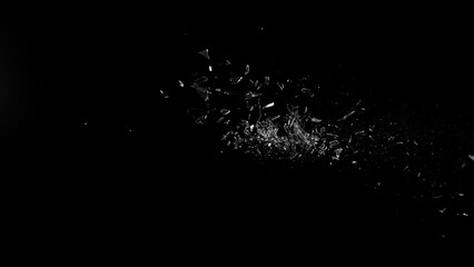 Freeze Motion Shot of Breaking Real Glass Isolated on Black Background