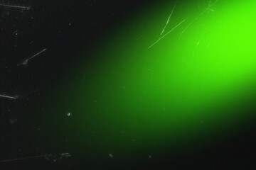 light leak overlay effect with scratch dust and green blur light,retro noisy film texture light leak flare on black background,abstract background with ray light,grunge old film burn background