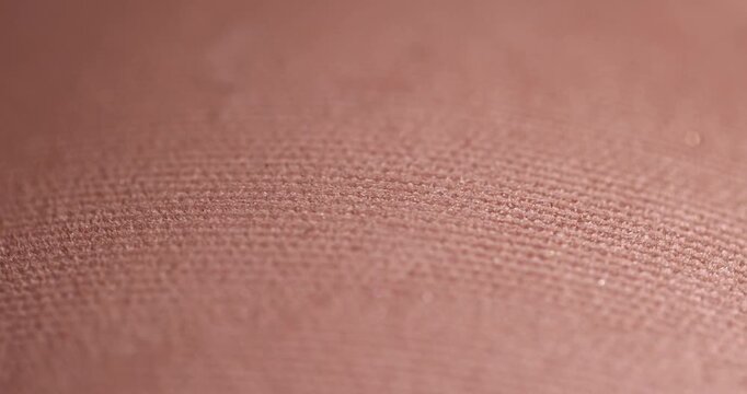 a jar of cosmetics for face makeup, details of new embossed solid cosmetics for applying daily makeup