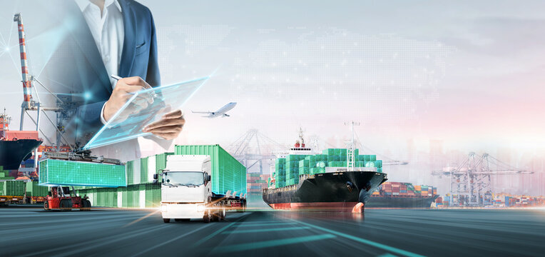 Digital green logistics and smart supply chain management. Businessman uses a tablet to control global multimodal transportation, shipping, and freight import export across the worldwide network.