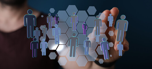Hand reaching towards a digital representation of interconnected people, symbolizing networking and community.