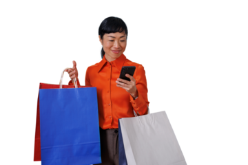 Asian woman online shopping using smartphone, holding many colorful retail paper bags, transparent background