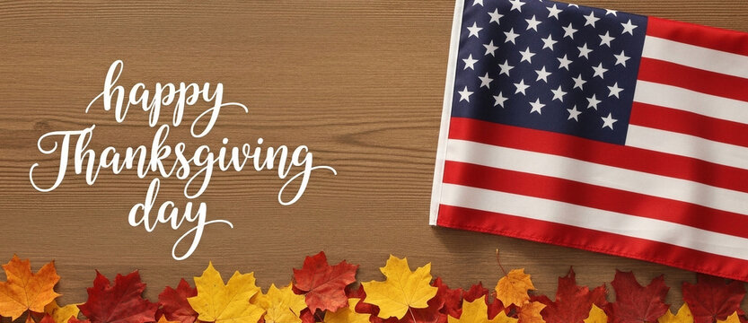 Happy Thanksgiving Day greeting text with an American flag and maple leaves on tabel, a festive header for a holiday website banner and cover - Powered by Adobe