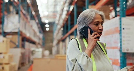 Mature woman, frustrated and phone call in warehouse for shipping delay or storage issue in depot. Female person, executive or inventory manager talking with mobile smartphone for supply chain fail - Powered by Adobe