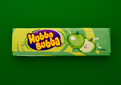 LONDON, UK - FEBRUARY 19, 2025: Hubba Bubba original chewing gum with green apple flavour on green background.