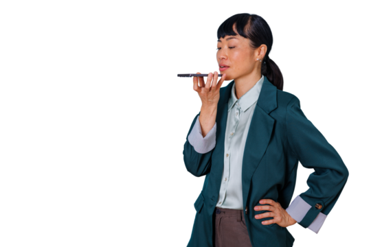 Businesswoman recording a voice message using phone, standing against transparent background, communicating and managing tasks