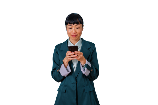 Asian businesswoman wearing a green coat, using smartphone, texting, communicating, and connecting on transparent background - Powered by Adobe