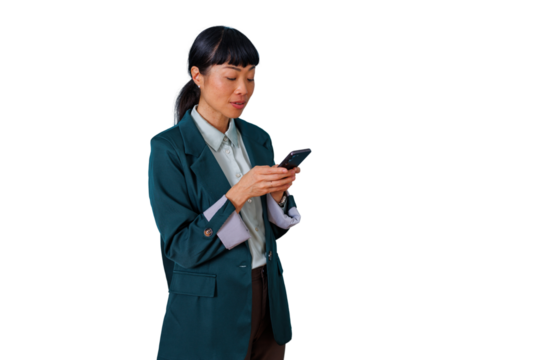 Asian businesswoman texting on a smartphone, engaged in digital communication and mobile technology with a transparent background - Powered by Adobe