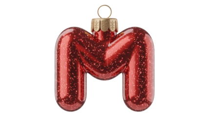 Shiny red letter m christmas ornament with glitter inside hanging from a gold loop isolated on transparent background