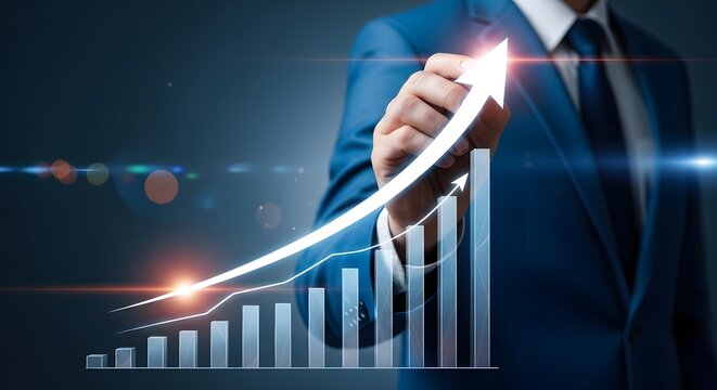 Businessman drawing upward growth arrow over financial chart