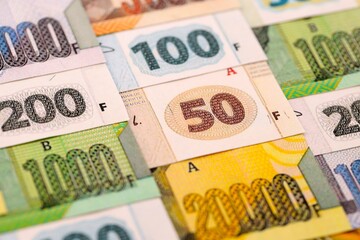 Congolese franc money bills in big amount on table close up. Rich life concept in Democratic Republic of Congo. Business and economy